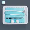 Caja de instrumentos orales desechables para dentista paquete de examen dental bandeja de plástico Taller de herramientas de enfermería al por mayor