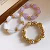 Pulsera elástica de acrílico geométrico irregular vintage nueva con un diseño de nicho, joyería de moda trendy para mujer