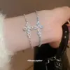 Pulsera Colgante Cruz Deslizante de Mariposa de Circonita Super Brillante, Pulsera Moderna y Exquisita, Joyería al por Mayor de Lujo Ligero y de Alta Gama