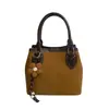 Bolso de cubo de mano de moda para mujer, nuevo modelo otoño e invierno 2026, bolso simple de hombro y cruzado, versión coreana, vintage y sofisticado