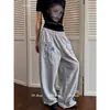 Parche de letra elástico para comercio transfronterizo, pantalón casual deportivo de estilo americano con bolsillo de solapa y cordón