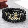Moda de joyería europea y americana vintage pulsera negra esmerilada corona de circón bola de diamante dados cabeza de león pulsera de cuentas traje