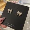 Pendientes de botón estilo coreano Dongdaemun con lazo de perla pequeña y adorable lazo de circonita con microincrustaciones, aguja de plata S925