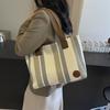 Bolso de rayas de gran capacidad para mujer, nuevo bolso de tela 2024, bolso de trabajo informal de moda, bolso de clase, bolso cruzado de un solo hombro en color contrastante.