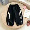 Pantalones largos para niños 2026 primavera y otoño nuevo estilo niños estampado de dibujos animados coreanos pantalones casuales pantalones jogger para bebé marca de moda para niñas