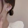 Pendientes de lazo 2025 nuevos pendientes de diseño de nicho de moda pendientes pequeños minimalistas de tachuela con gota de aceite para mujer para otoño