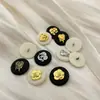 Botón metálico redondo doble estilo francés Chanel estilo socialité botón para ropa hebilla para abrigo de mujer suéter accesorios de joyería
