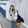Camisa de Malha Básica Versátil Solta com Gola Redonda e Mangas Longas Recortada, Estilo Novo Primavera 2025, para o Trabalho, de Dongdaemun, Coreia do Sul