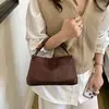 Bolsa Feminina Clássica Nova Outono 2026 Bolsa de Mão Versátil Design de Nicho de Alto Padrão Bolsa de Ombro Transversal Bolsa de Mão