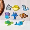 Animales marinos luminosos ballena tortuga marina accesorios de resina DIY pegamento de crema papelería hebilla de zapato material para funda de teléfono parches