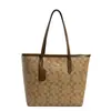 Bolsa de compras de alta qualidade e grande capacidade bolsa feminina nova temporada 2026 Bolsa tote versátil Coach bolsa grande popular bolsa transversal