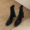 Botas elásticas adelgazantes de superficie suave estilo retro, botas Martin de tacón alto con punta cuadrada de comercio exterior transfronterizo, botines negros de moda para mujer