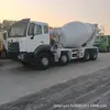 Fornecimento transfronteiriço de caminhões betoneira Howo usados, grandes caminhões betoneira Howo NX371 de 10 metros cúbicos com tração nas quatro rodas na frente e tração nas oito rodas atrás