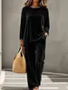 2026 Otoño e Invierno transfronterizo europeo y americano nuevo conjunto casual para mujer con cuello redondo, manga larga, pantalones de longitud extendida, traje de terciopelo para mujer