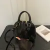 Bolsa de mão em madrepérola, cor sólida, simples, fashion, moderna, nicho, casual, estilosa, bolsa de ombro único cruzada, novo modelo de verão