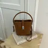 Bolso de Mano Francés Transfronterizo para Mujer 2026 Nuevo Elegante Cubo Hombro Único Nicho para Viajes Cotidianos Portátil Cruzado Bolso Pequeño para Mujer