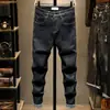 Jeans negros de primavera nuevos de alta gama, a la moda, para hombre, pantalones skinny de corte ajustado, pantalones largos elásticos juveniles a la moda, estilo coreano