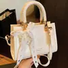 Outono de 2026 Novo Estilo Coreano Nicho Alto Valor Moderno Simples para o Dia a Dia Bolsa Pequena Feminina Transversal Quadrada Pequena