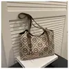 Bolso de mano nuevo de comercio exterior con estampado de rombos, un bolso de mano simple y versátil que se puede llevar debajo del brazo, un bolso tote práctico y elegante para ir al trabajo, diseñado para mujeres
