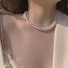 Collar de perlas de doble capa estilo retro francés para mujer, ligero, lujoso, de alta gama, con cadena para el cuello.