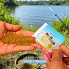 Um ninho de iscas de pesca Isca de painço Peixe painço Pesca selvagem em poços pretos Carpa Crucian Carp Arroz com vinho Isca de fundo Aroma medicinal de três cores Painço