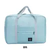 Nueva bolsa de almacenamiento de rendimiento de gran capacidad bolsa de almacenamiento para el hombro bolsa plegable portátil bolsa para avión bolsa de regalo al por mayor en stock