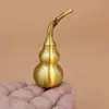 Cabaça de latão brilhante com folhas, um ornamento de cabaça de cobre que pode ser torcido para abrir, uma decoração de mesa estilo chinês tradicional e um presente personalizável de um fabricante
