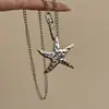 Collar Colgante de Estrella de Mar Plateada Vintage Dulce Genial Nicho para Mujer Y2K Spice Girl Old Waste Viento de Tierra Cadena Clavicular de Estrella de Cinco Puntas