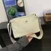 Bolsa Feminina 2025 Outono Nova Moda Bolsa de Tecido Cor Sólida Tendência Bolsa de Ombro Casual Transversal Pequena para o Dia a Dia