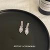 Nuevos exquisitos aretes de temperamento de gota de agua con incrustaciones de circonia japonesa y coreana, aretes de moda simples para el día a día, venta al por mayor para mujeres