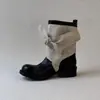 Botas de Tobillo Vaqueras de Caballero con Tiras Patchwork de Lona y Moño, Colección Primer Encuentro, Nuevas Botas de Media Caña Otoño/Invierno 2026