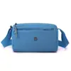 Bolso Pequeño Ligero y Elegante 2025 Primavera/Verano Nuevo Bolso Cruzado para Mujer Estilo Commuter Lona de Nylon Bolso Cuadrado Pequeño Casual para Hombro