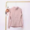 Jaqueta LULU DF com gola alta e logo, em estoque para entrega imediata, justa ao corpo, respirável, elástica, com zíper dourado, para fitness e esportes