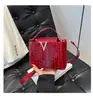 2025 Nova Estampa de Pedra Portátil Acessível Luxo Moda Ombro Retrô Elegante Transversal Tendência Bolsa Pequena de Balde Feminina