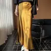 Falda midi de satén dorado con abertura lateral para mujer, primavera y otoño, de cintura alta, adelgazante, brillante, estilo retro francés, falda de línea A