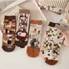 Calcetines mujer otoño e invierno nuevos calcetines de tubo de dibujos animados calcetines de panda lindos calcetines de algodón para dama fabricantes venta al por mayor