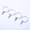 Al por mayor Varios Estilos de Aleación de Zinc Metal Juguete Ferretería Accesorios Llavero Regalo Ferretería Llavero Hebilla para Perro Gancho