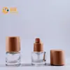 Popular Set de Empaque de Botella de Vidrio para Cosméticos con Bomba Dosificadora 15ml Loción Esencia