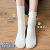 Soporte calcetines de tubo personalizados para dama una variedad de calcetines de felpa de color sólido ins japoneses opcionales fabricantes de calcetines de algodón al por mayor