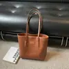 Bolsa de palha tecida de grande capacidade estilo coreano para mulheres, adequada para uso casual, trabalho, aulas da faculdade e deslocamento em 2026