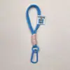 Llavero de Cuerda de Nylon de Doble Capa Mosquetón Colgante de Muñeca Cadena para Teléfono Móvil Colgante de Peluche Lanyard Trenzado Colorido