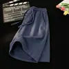 Pantalones cortos deportivos de color liso con corte diagonal para hombre, ropa de verano para exteriores, corte holgado, pantalones cortos juveniles hasta la rodilla, nuevos pantalones casuales de moda 2026