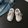 Zapatos Forrest Gump para bebé niña 2026 otoño nuevo versión coreana estilo gato zapatillas de entrenamiento alemanas zapatillas de suela blanda para niñas zapatos de exterior para niños
