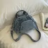 Bolsa de Mão para Estudante Design para Ir ao Trabalho Feminina Bolsa de Nicho Boston Moda Bolsa Transversal Versátil Novo Estilo Tecido Jeans Tendência 2026
