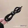 Elegante pinza para el pelo con lazo en la nuca, pequeña pinza tipo banana de malla de encaje estilo Chanel, pinza negra para peinado semi-recogido para mujer