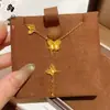 Tienda de Oro Mismo Estilo Collar Mariposa Corazón Hielo Triturado Chapado en Oro para Mujer, Alta Retención de Color, Brújula de los Ocho Tesoros, Collar de Monedas de los Cinco Emperadores Venta al por Mayor