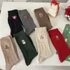 Calcetines de mujer de caña media otoño e invierno patrón de cáñamo calcetines de Navidad bordado de muñeco de nieve moda todo a juego calcetines de felpa Zhuji