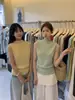 Liquidação, Sem Devoluções ou Trocas. Atacado de Roupas Femininas, Estilo Minimalista, Versátil, Emagrecedor, Confortável, Gola Alta, Colete Sem Mangas para Mulheres 88139