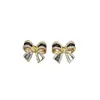 Joyería Hecha a Mano DIY Montura Vacía Aretes de Perla para Mujer Tachuelas Accesorios Exquisito Moño Negro Joyería Comercio Exterior Mayoreo