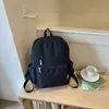 Mochila de color sólido serie estilo suave de baja saturación para estudiantes universitarios, simple y versátil para clases y viajes cortos, mochila de almacenamiento